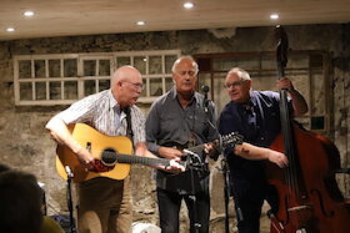 Trio Lowell Coppo Kärner at Folkclub Prisma e. V. Pforzheim - Bluegrass Music — photo 1